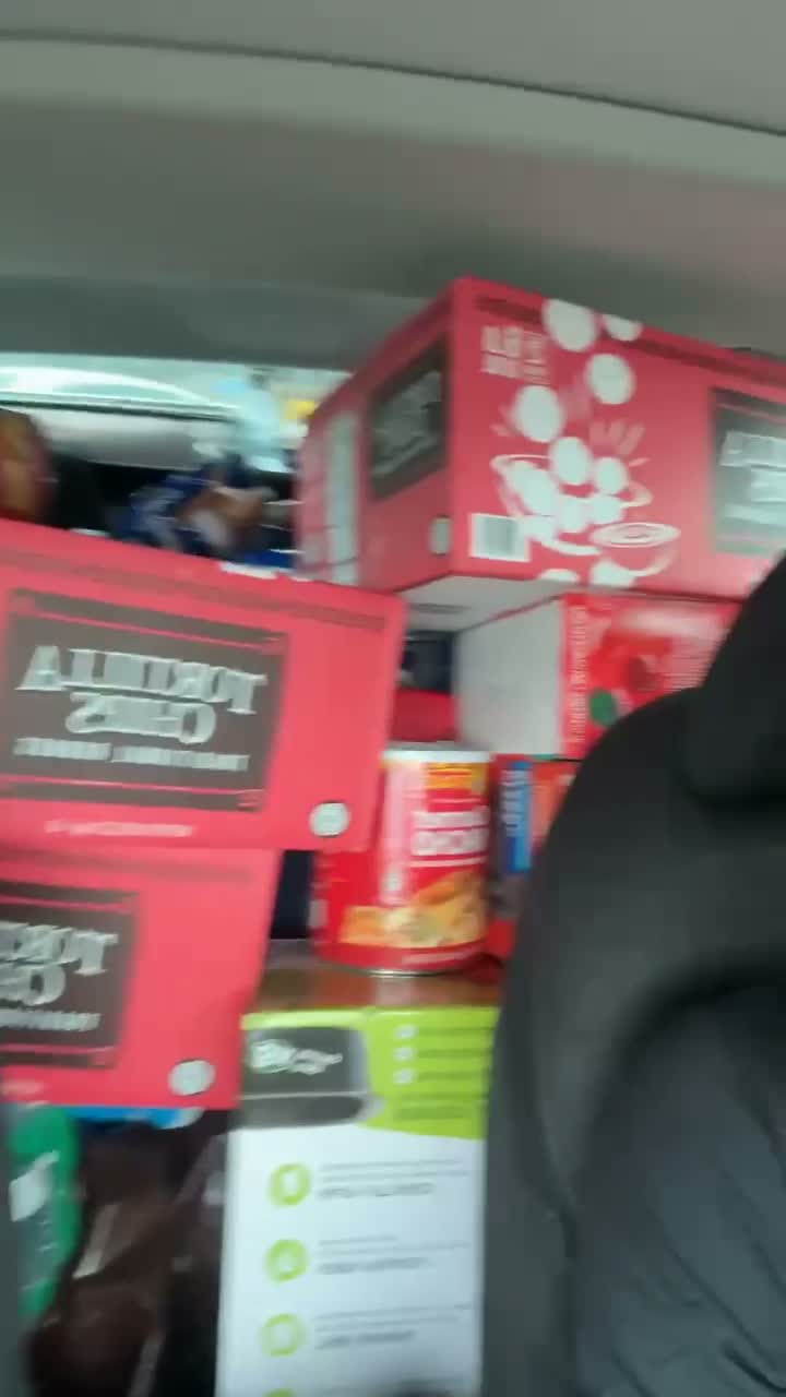 LoDeana's car packed full of supplies for the community, the Kindness Mobile in action